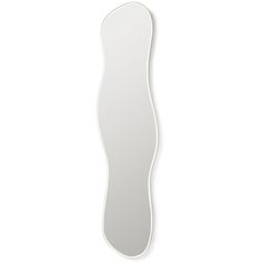 a mirror that is on the wall next to a white flooring area with an oval shape