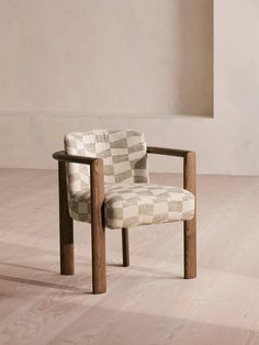 a chair sitting on top of a hard wood floor