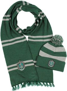 a green scarf and hat with harry potter crests on the side, both in grey and white stripes