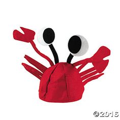 a red crab made out of paper with googly eyes