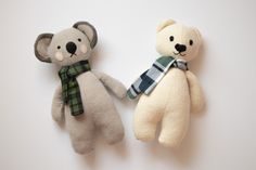 two teddy bears with scarves on their heads