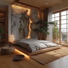 a bedroom with stone walls and flooring in the middle, along with large windows