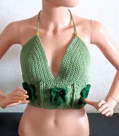 I know you will love this crocheted St Patrick's Day Crop Top as much as I did making it! Made with 100% cotton, acrylic, love and detail.   I use premium cotton, this should hold up forever and has sturdy straps!   You are sure to get compliments as I have not seen a St Patrick's top like this around and wanted one myself! Great for upcoming St Patrick's Day parties, events, festivals or just to wear for fun! **Hand wash or machine wash cold** **Lay flat to dry, do not wring out** Green Handmade Cotton Crochet Top, Handmade Green Cotton Crochet Top, Green Cotton Crochet Top, Green Fitted Crochet Knit Top, Green Fitted Knit Crochet Top, Green Cotton Crochet Top With Crochet Trim, Green Crochet Top With Crochet Trim For Festival, Green Crochet Lace Cotton Top, Casual Green Cotton Patterns