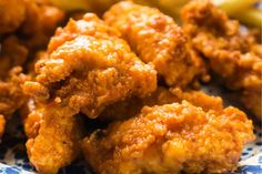 some fried food on a blue and white plate