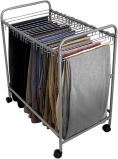 a metal rack with clothes on wheels