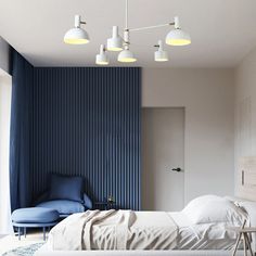 a bedroom with blue walls and white furniture