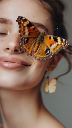 a woman with butterflies on her face