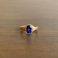 Faceted Oval Tanzanite Ring Classic Oval Sapphire Signet Ring, Classic Sapphire Oval Signet Ring, Timeless Yellow Gold Amethyst Ring With Oval Shape, Timeless Gold Oval Amethyst Ring, Timeless Oval Gold Amethyst Ring, Gold Tanzanite Oval Ring, Timeless Oval Tanzanite Rings, Newport Ri, Tanzanite Ring