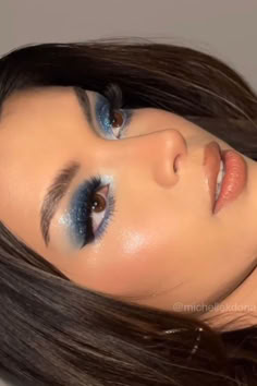 Get inspired by these stunning blue makeup looks that will elevate your glam game! Whether you're aiming for a vibrant blue makeup look for prom or subtle light blue makeup ideas, our curated selection has it all. Dive into the trend with bold blue eyeshadow designs, shimmery finishes, and unique eye makeup techniques that make you stand out. These blue makeup looks. Discover your perfect look and embrace the allure of blue! makeup ideas blue eyeshadow for blue dress Deep Blue Makeup Looks, Blue Liquid Eyeshadow, Blue Makeup Inspiration, Blue Full Face Makeup, Shimmery Blue Eyeshadow, Royal Blue Eye Makeup Prom, Blue Eyeshadow Makeup Tutorial, Makeup For Blue Dresses, Light Blue Makeup Ideas