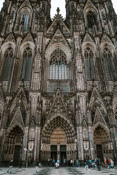 the large cathedral has many windows on it's sides and is very ornately decorated