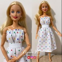 the doll is wearing a white dress with multicolored dots