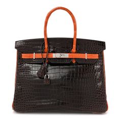 This is the authentic HERMES Shiny Porosus Crocodile Birkin 35 in Havane and Orange. This stunning handbag is crafted with  brown shiny crocodile with orange trim. It features palladium silver hardware and opens to an orange goatskin leather interior with a zipper and patch pockets. Hermes Crocodile Birkin, Himalayan Crocodile Birkin, Hermes Orange Bag, Luxury Orange Bags With Silver-tone Hardware, Hermes Black Small With Shiny Cocrodile, Oversized Bag, Dior Jewelry, Versace Bags, Wallet Fashion