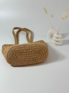 Summer Beige Crochet Bag Made Of Yarn, Summer Handwoven Crochet Bag Made Of Yarn, Eco-friendly Rattan Crochet Bag, Casual Natural Color Crochet Bucket Bag, Casual Natural Crochet Bucket Bag, Beige Braided Jute Straw Bag, Beige Braided Crochet Bag, Rectangular Shape, Casual Beige Crochet Bag With Braided Detail, Casual Crochet Bag With Braided Handles In Natural Color