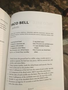 an open book with the words taco bell written in black and white on it