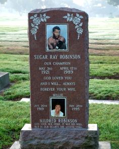 the headstone of sugar ray robinson is shown in front of an empty field with grass