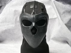 Become the scary Deimos from Rainbow 6 wearing this stunning mask. Hand painted and fitted with tinted lenses. Tactical black balaclava and eco leather straps complete the look.  Make your enemies fear your very presence wearing our top quality face mask! 🎭 Step into the shoes of the enigmatic Deimos from Rainbow 6 with this exquisitely crafted mask! 🌈 Immerse yourself in the tactical world of R6 as you don this stunning Deimos operator mask. 🎨 Meticulously hand-painted and detailed, this rep Deimos R6, Fencing Mask, Oni Mask, Costume Mask, New Gadgets, Armor Concept, Mask Design, Costume Accessories, Cute Anime Character