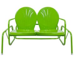 two green chairs sitting next to each other