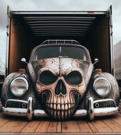 a car with a skull painted on the front