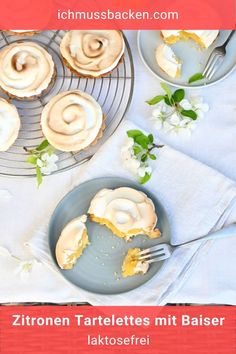 an image of some pies on a plate with a fork and flowers in the background