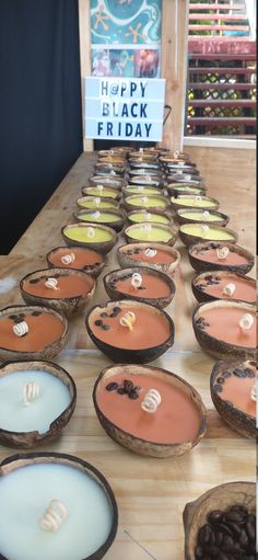 a table topped with lots of pies covered in frosting