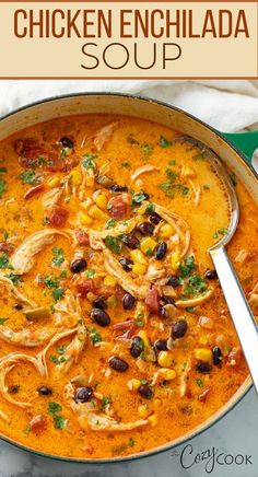 chicken enchilada soup in a pan with a spoon