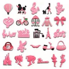 a bunch of pink and white items are arranged in the shape of letters, numbers, and symbols