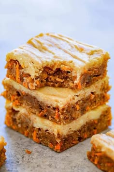 carrot cake bars stacked on top of each other