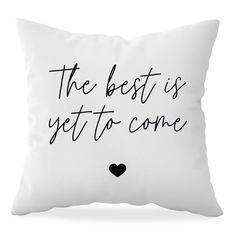 the best is yet to come pillow with black heart on white background, handwritten quote