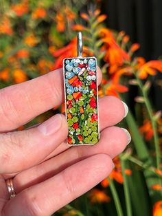 Crocosmia micro mosaic pendant with hand-pulled filati in rectangular base. Eggshell Mosaic, Italian Mosaic, Apoxie Sculpt, Boho Jewelry Diy, Micro Mosaic Jewelry, Mosaic Jewelry, Floral Mosaic, Funny Gift Ideas, Market Ideas