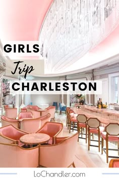 the inside of a restaurant with pink chairs and chandelier