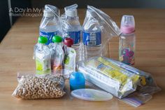 the contents of a baby's diaper laid out on top of a wooden table