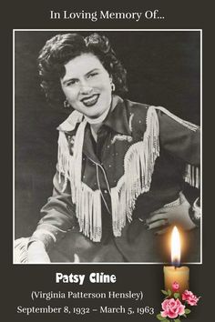 a poster with a candle in front of it and a photo of a woman smiling