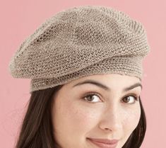 a young woman wearing a knitted hat