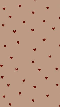 a brown background with red hearts in the shape of small heart shapes on top of each other