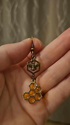 In honor of our "Honey Man" Grandfather, who recently passed on, these bee-themed earrings celebrate his memory. Bottles contain his real, raw honey. Handmade Honey Color Jewelry Gift, Handmade Honey-colored Jewelry For Gifts, Handmade Honey Jewelry For Gift, Honey Bee Earrings, Honey Gifts, Hood River, Bee Earrings, Raw Honey, Antique Earrings