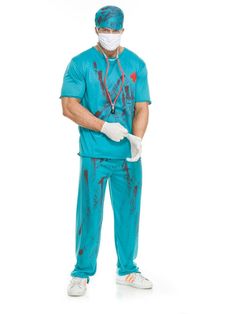 a man in scrubs is standing with his hands on his hips and wearing a surgical mask