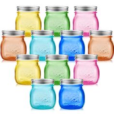 six different colored mason jars with lids on each one and the other two are empty