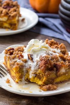 a slice of pumpkin pie on a plate with a fork