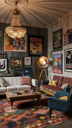 a living room filled with furniture and pictures on the wall