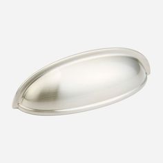 an oval metal object on a white background