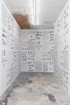 an empty room with writing all over the walls