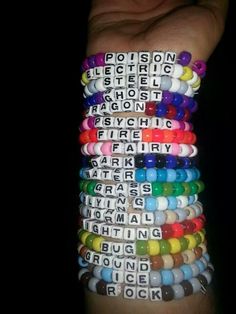 A Bunch Of Bracelets, Aesthetic Friendship Bracelets Beads, Edc Kandi Bracelets, Pokémon Bracelet, Matching Kandi Bracelets For Couples, Kandi Phrases, Kandi Ideas Singles, Pride Kandi