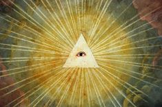 an all seeing triangle with rays coming from it