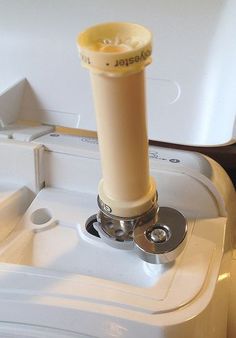 a blender sitting on top of a counter next to a sink