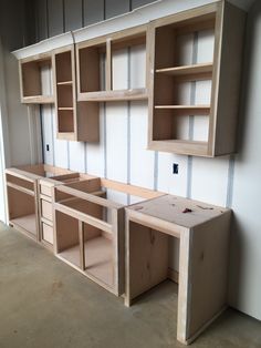 the unfinished cabinets are ready to be built into the wall and put together for storage