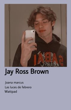 a young man taking a selfie with his cell phone in front of him and the caption says jay ross brown