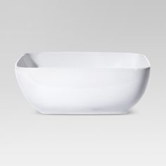 a white bowl sitting on top of a table