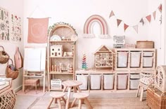 a room filled with lots of wooden furniture and decor on the walls, along with toys