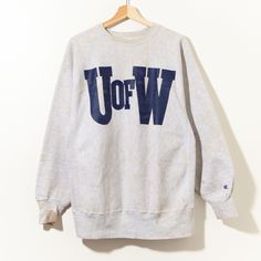 "90s reverse weave Champion University of Washington crewneck sweatshirt X-LARGE : see measurements for exact fit Measurements: Chest : 23\" (Pit To Pit) Length : 26.5\" (Center Back Neck to Bottom Hem) Condition: Stained, Distressed, Thick, Worn to Perfection *USE ZOOM FOR DETAILS. Material: 90% Cotton 10% Polyester Tag / Brand : Champion Made in USA heavyweight college athletic Russell RRL Gallery Dept American Workwear Spell Out *PLEASE BE AWARE THESE ITEMS ARE VINTAGE AND SHOW SIGNS OF WEAR. College Merch Aesthetic, Vintage College Shirts, Vintage College Sweatshirts, School Designs, Outfit Inso, American Workwear, Sorority Merch, Tommy Hilfiger Hoodie, University Outfit