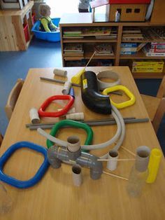 the table is covered with various tools for making something to look like a toy car